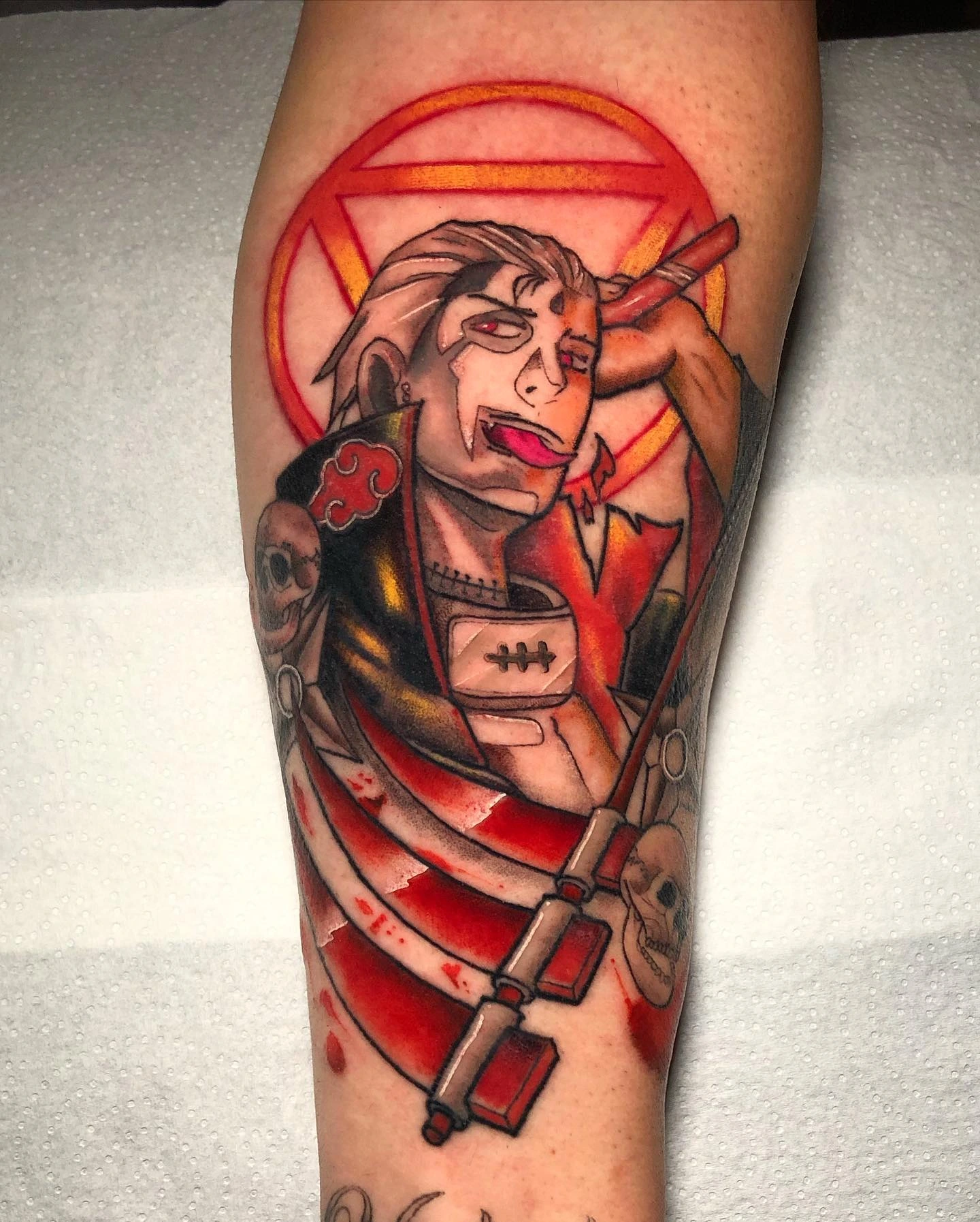 Hidan from Naruto/Akatsuki holding three-bladed scythe with blood red halo