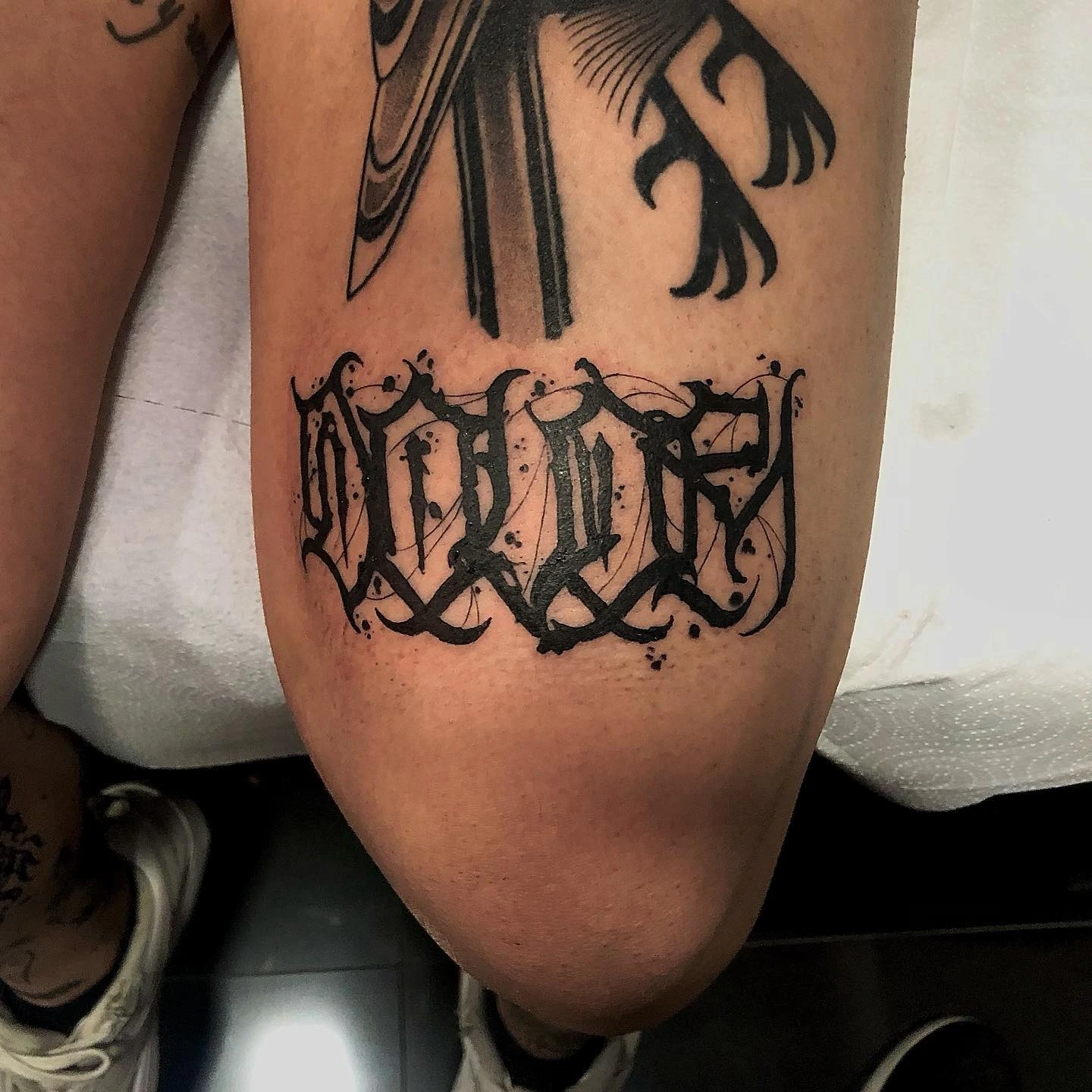 Chicano blackletter band on the leg
