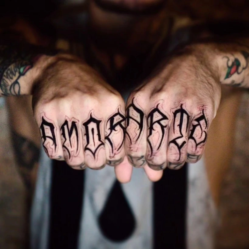 Knuckle/finger lettering 'ANDRES' (chicano blackletter)