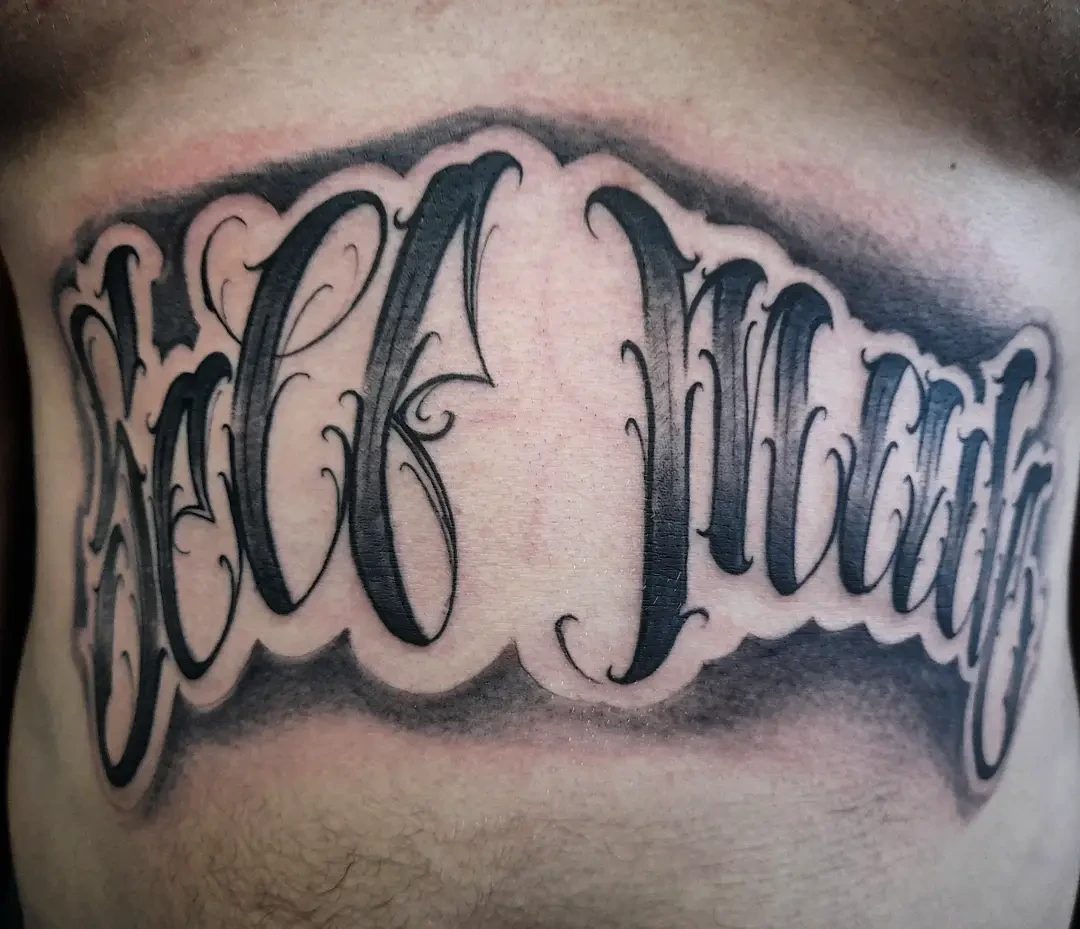 'Self Made' chicano filigree across stomach