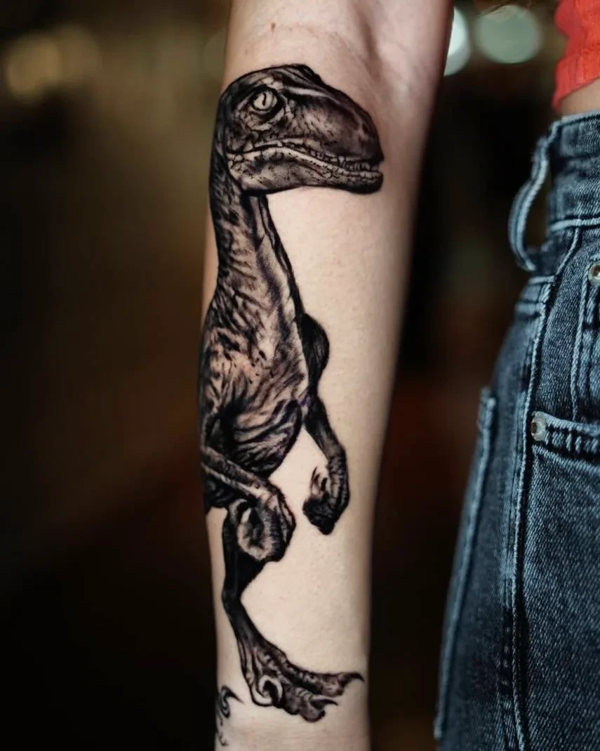 Velociraptor on forearm