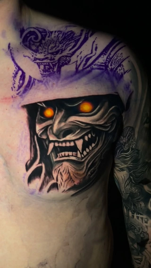 Glowing-eyed oni / hannya demon mask with stencil ghost above (in progress)