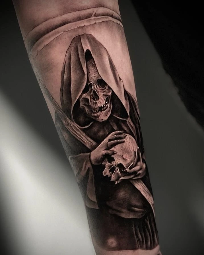 grim reaper hooded skull holding skull (Death)