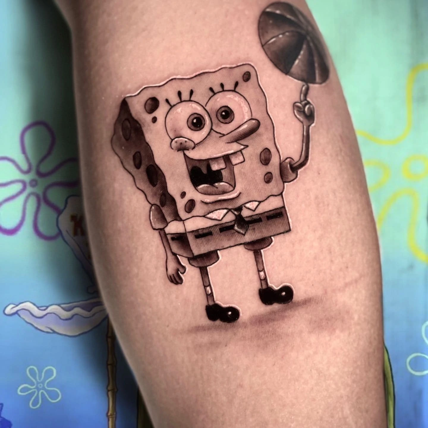 SpongeBob (Bob Esponja) cartoon character with umbrella
