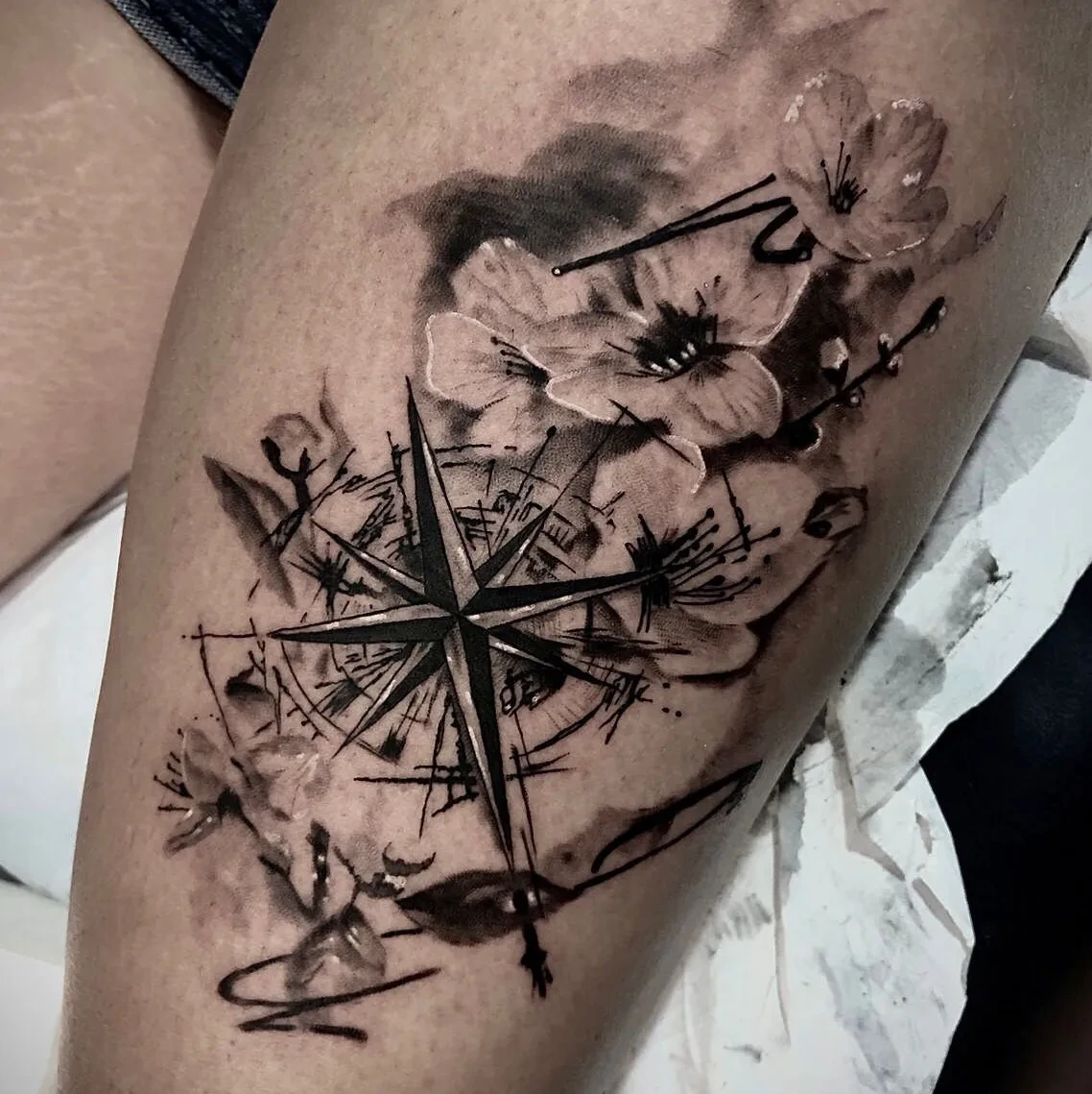 compass rose with cherry blossom flowers, splashy ink trash-polka style