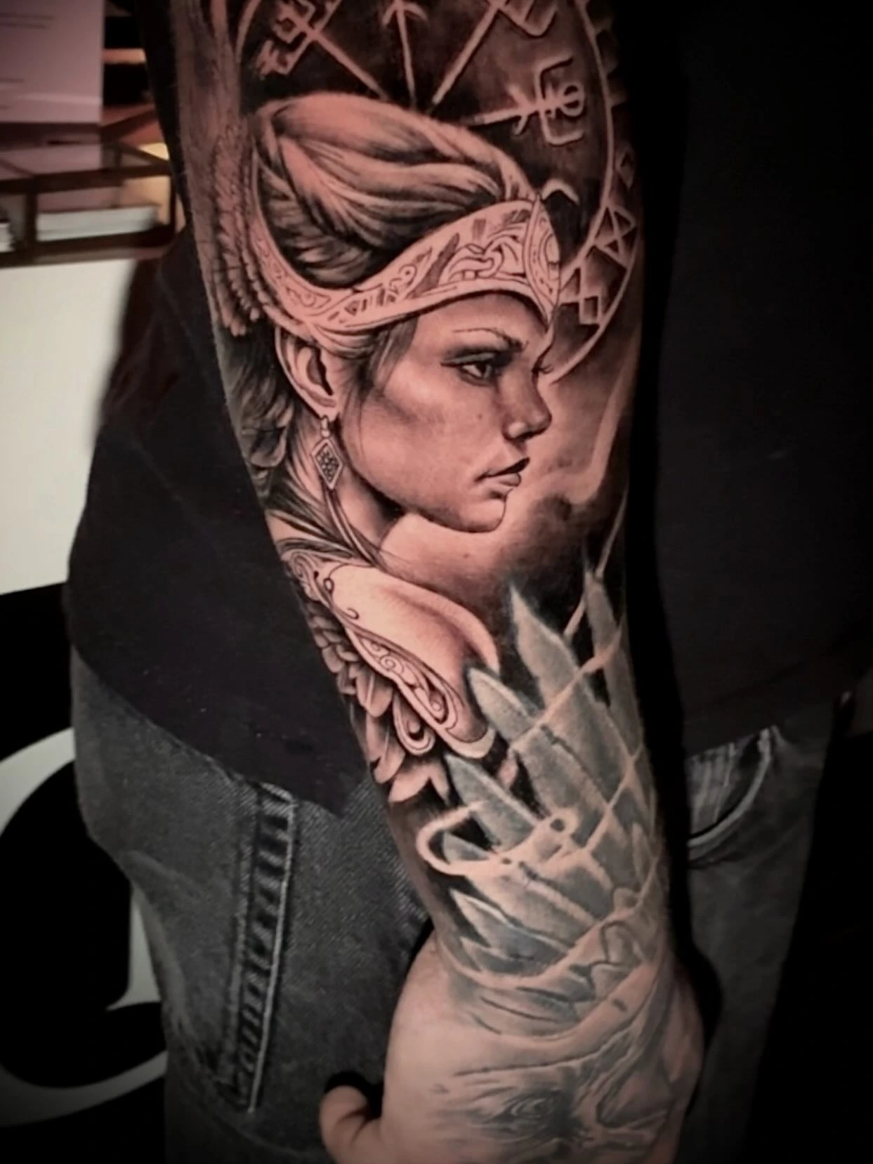 Valkyrie/Norse warrior woman portrait with ornamental helmet and runes/vegvisir background